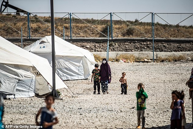 A group of 12 Australian women and 22 children, aged between 5 and 56, are easy targets in the al-Roj detention camp in northeastern Syria, where many of them have been held for four years (pictured is the al-Roj camp in September 2020)