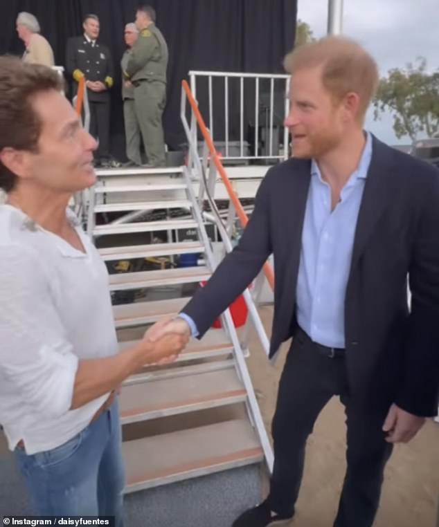 Pictured: Prince Harry shakes hands with Richard Marx, who performed at Kevin Costner's One805Live! concert yesterday