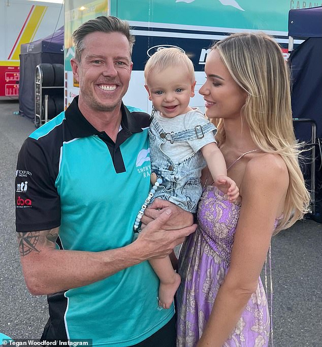 V8 Supercars star James Courtney and wife Tegan Woodford are expecting their second child. (Pictured in 2023 with their son Kobe)