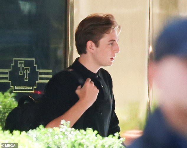 Barron Trump was spotted during his first days on campus at NYU after it was revealed that the school's interim dean called his father a 'threat' to the United States