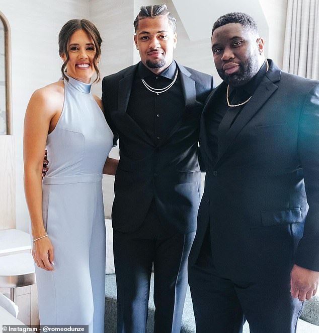 Rome Odunze, center, is seen with his mother, Necia Bunnell, and his father, James Odunze