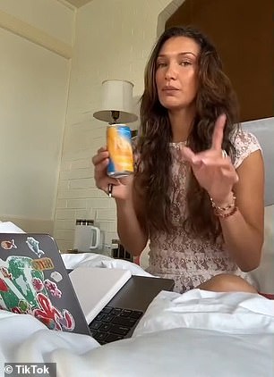 The model also opened a can of her Kin Euphorics drink, which she drinks first thing in the morning, and took a sip of the Actual Sunshine flavor