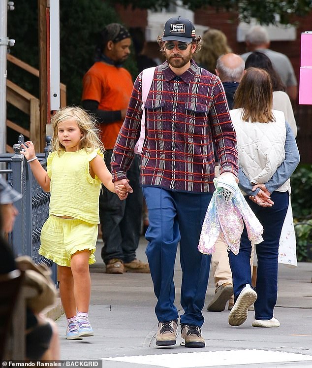 Bradley Cooper was a devoted father indeed as he enjoyed a stroll with his daughter Lea de Seine in New York City on Wednesday