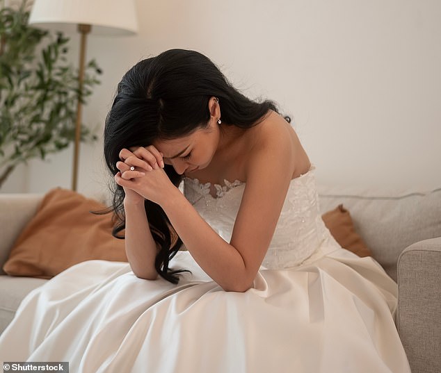 A bride wonders if she's wrong for being 'angry' after '70 percent' of her guests showed up to her wedding without offering a gift or card (stock image)