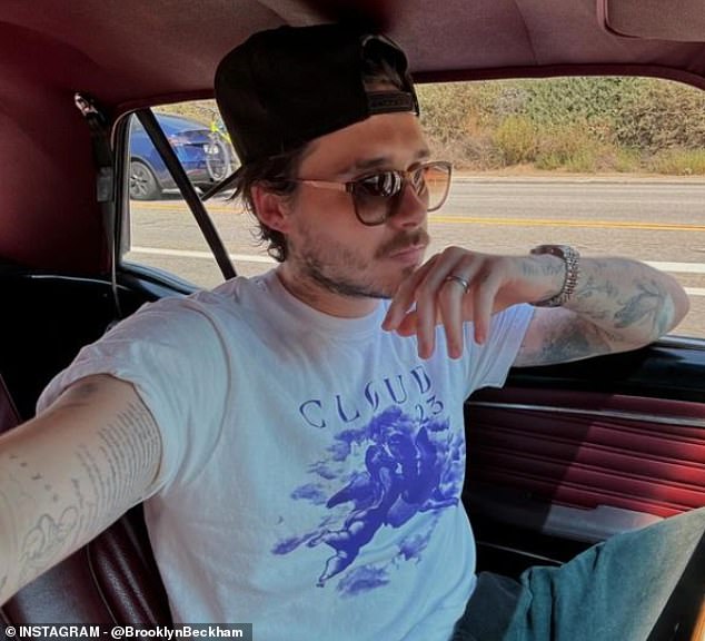 Budding chef Brooklyn Beckham, 25, has revealed his latest career move (pictured wearing a 'Cloud 23' shirt - the name of his new brand)