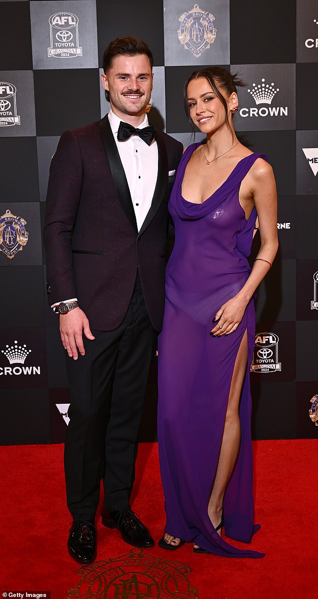 WAG Jessica Edwards, 26, got the attention for more reasons than she could have hoped for at the Brownlow Medal on Monday night as her nipple covering was visible through her sheer dress. Pictured with boyfriend St Kilda player Jack Sinclair, 29