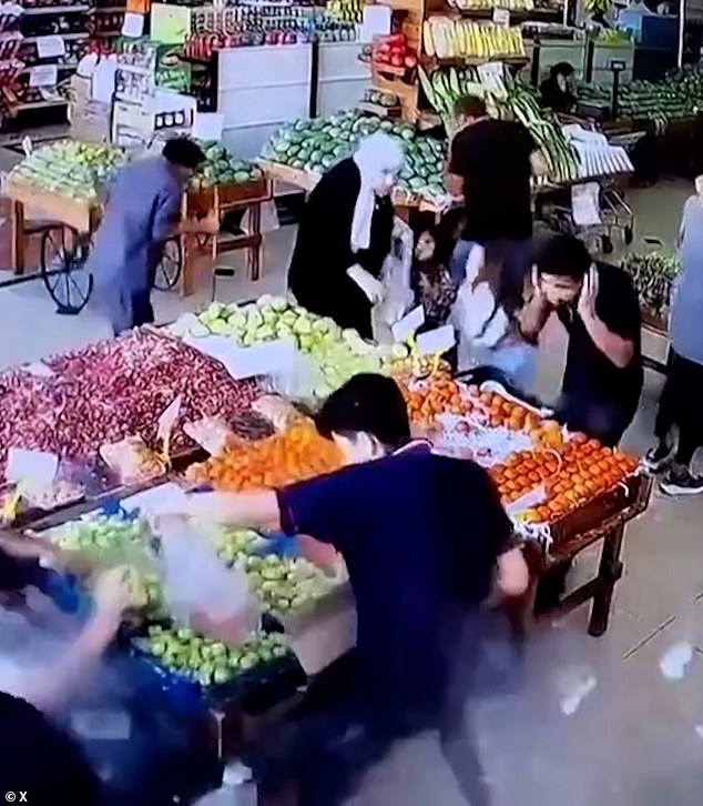 CCTV footage shows a beeper being detonated in a supermarket