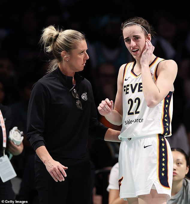 Christie Sides and Caitlin Clark talk in Brooklyn after the rookie suffered a ruptured eardrum