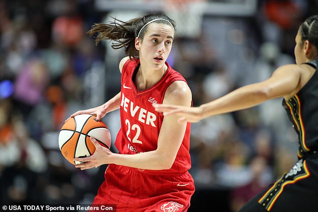 Indiana Fever guard Caitlin Clark (22) owns the ball in her first playoff series