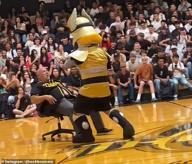 The principal of a California high school has been demoted after a video of him dancing inappropriately with the school mascot went viral