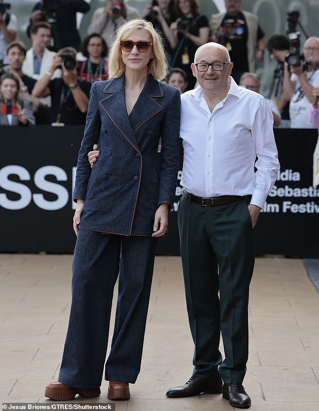 The Tár alumnus appeared to be in high spirits as she blew kisses to fans and posed for photos with festival director José Luis Rebordinos