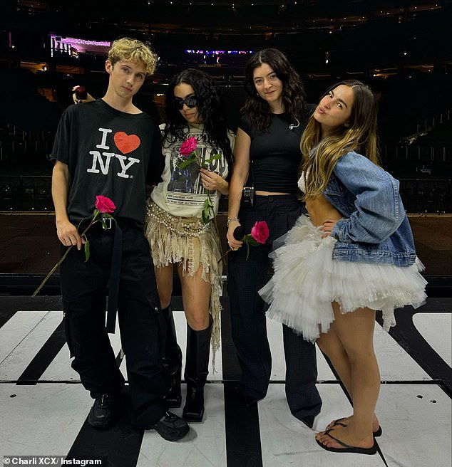 Charli shared a gallery of breathtaking photos on Instagram, showing her partying with some of her A-List friends. Pictured from left to right: Troye Sivan, Charli, Lorde and Addison Rae