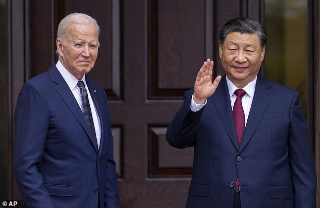 President Joe Biden, left, greets Chinese President Xi Jinping in Woodside, California, Nov. 15, 2023. A House of Representatives aide told DailyMail.com that China's new restrictions could pose a security risk to U.S. companies.