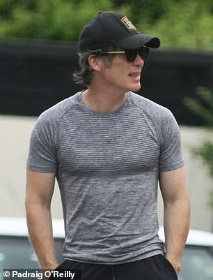 Cillian Murphy showed off his toned physique on Thursday as he hit the gym in Dublin following his gruelling weight loss regime for Oppenheimer (right)