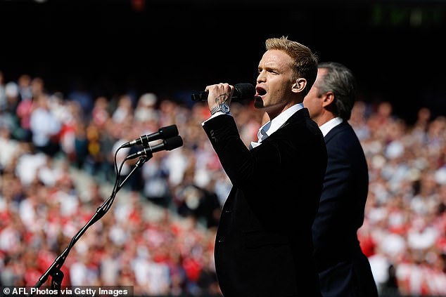 Champion swimmer and singer Cody Simpson (pictured) has received some cheeky compliments after his performance at the AFL Grand Final on Saturday