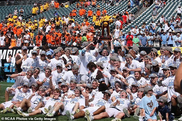 Tufts University Jumbos players celebrate winning the 2024 Division III national championship