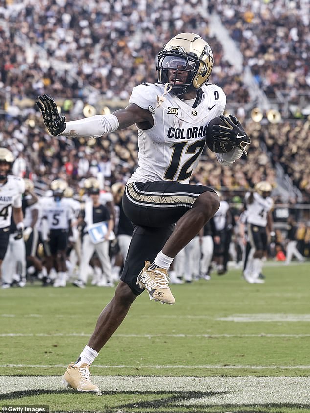 Travis Hunter struck the Heisman pose during Colorado's 48-21 loss at Central Florida