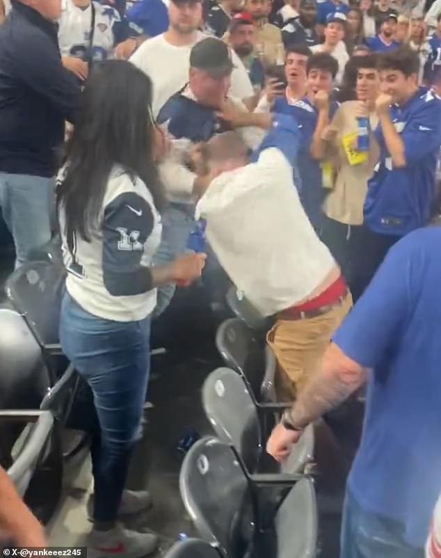 A Cowboys fan unleashed a series of punches on a Giants fan at MetLife Stadium on Thursday