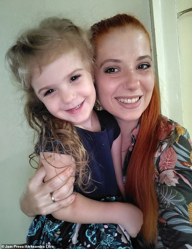 Aleksandra Litric, 28, from Leskovac, Serbia, has shared her daughter's unique hair, which sees her sport three different types of locks - but cruel trolls insist she should 'shave her head'