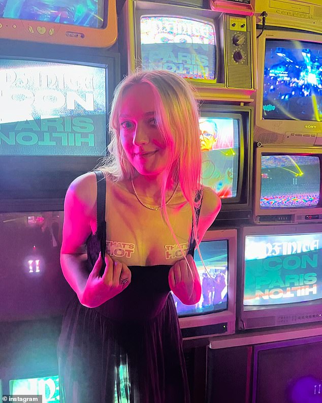 Dakota Fanning looked 'hot' as she celebrated the release of Paris Hilton's second album Infinite Icon