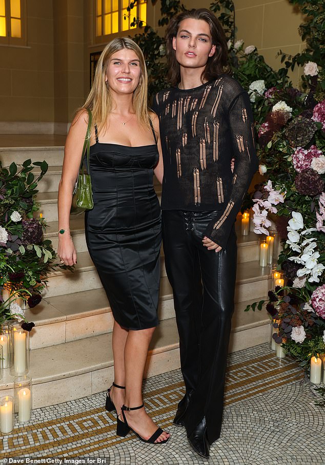 Damian Hurley, 22, stunned in a distressed black top as he and his niece Amelia Hurley attended the British Vogue and Rabanne party for London Fashion Week on Friday