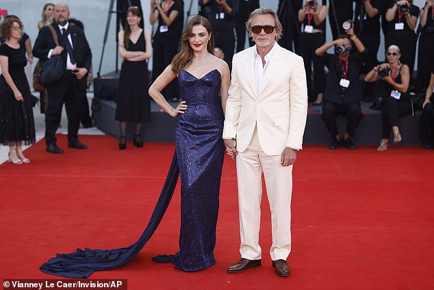 Daniel Craig and his wife Rachel Weisz looked loved up as they hit the red carpet at the Venice Film Festival's Queer premiere on Tuesday