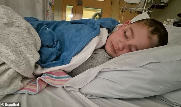 Despite undergoing multiple tests and visiting a specialist, medical staff failed to consider that the pain experienced by Yavuz Yalcin, nine, (pictured) could be from pain in his spine