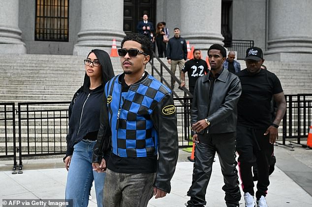 Combs' sons Justin Combs, 30, and Christian Combs, 26, pictured leaving a New York courthouse on September 18