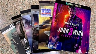 4K Blu-ray action movies playing on a kitchen counter