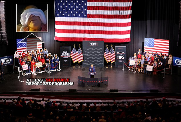 Above, Trump is seen at the rally at Tucson Music Hall. Those standing to the right of the former president on stage reported the injuries