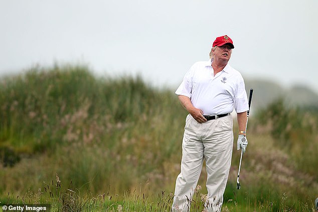 Donald Trump narrowly escaped death again after a gunman tried to shoot him while he was playing golf (pictured: Trump playing golf in 2012)