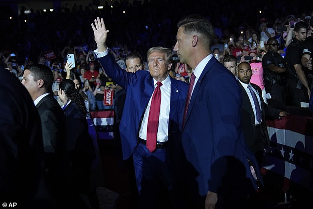 Donald Trump surrounded by his Secret Service unit during an event in Michigan on Tuesday