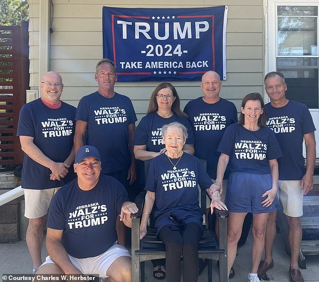 Eight Walz family members pose for a photo in Nebraska showing support for Republican rival Donald Trump