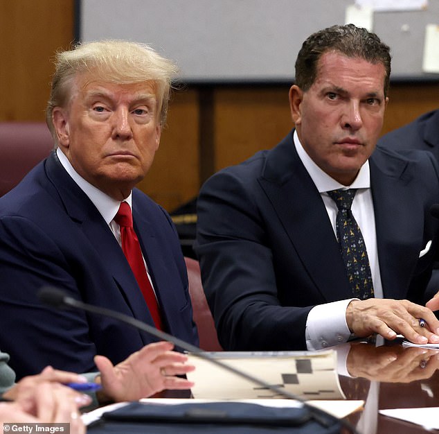 Donald Trump sits with his lawyer Joe Tacopina in a New York courtroom on April 4