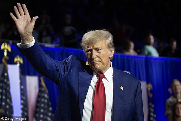 Pictured: Republican presidential candidate, former U.S. President Donald Trump, greets supporters after a campaign rally on August 29, 2024 in La Crosse, Wisconsin. A federal judge on Tuesday denied Trump's request to intervene in his New York hush-money lawsuit.