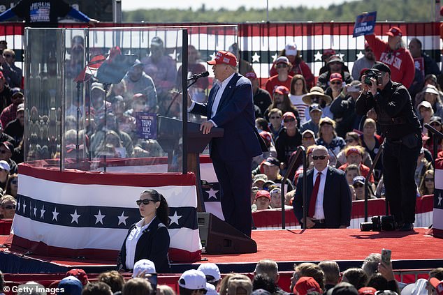 More than 7,000 people gathered to see the former president at his fourth campaign rally in the hotly contested state at Mosinee airport.