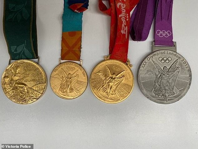 Police are appealing to the public for help in recovering the Olympic medals (pictured) stolen from Australian rower Drew Ginn