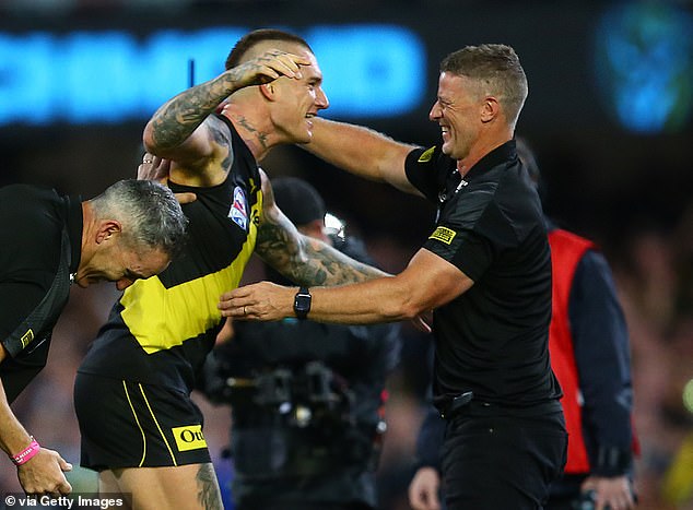 The Gold Coast Suns have confirmed that Martin (left) has spoken to the club about resuming his partnership with coach Damien Hardwick (right) in 2025.