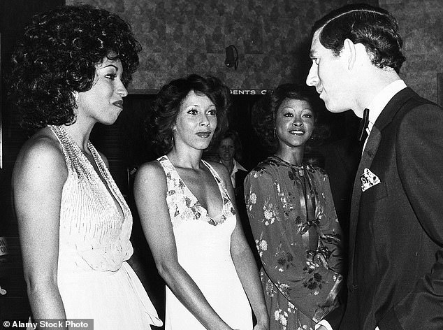 The Three Degrees meet then Prince Charles after a charity show in Eastbourne, Sussex in July 1978. From left to right: Sheila Ferguson, Helen Scott and Valerie Holiday