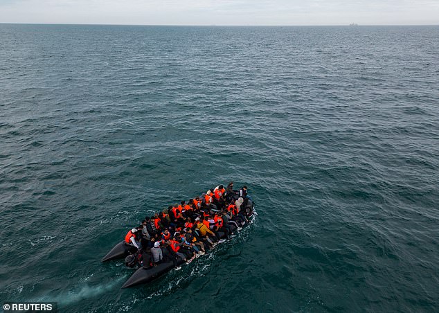 The photo shows an inflatable rowing boat carrying migrants heading towards the English Channel on August 6, 2024