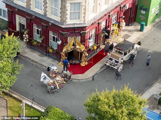 It looks like love is in the air in Albert Square as The Queen Vic was dressed up for a wedding on the EastEnders set in Elstree on Saturday.