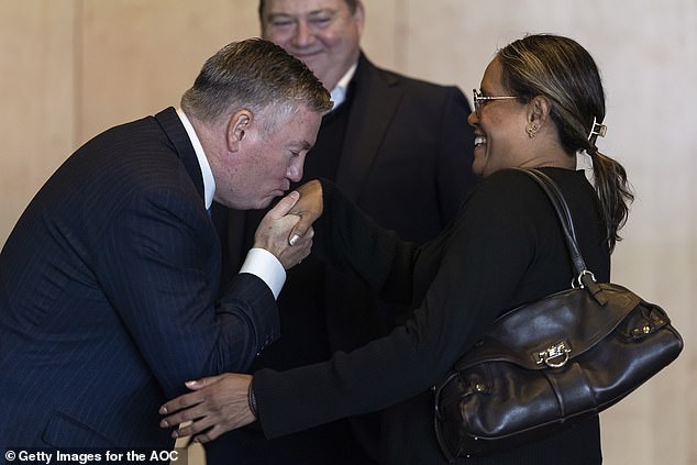 Eddie McGuire greeted Cathy Freeman with a kiss during a memorial service on Tuesday