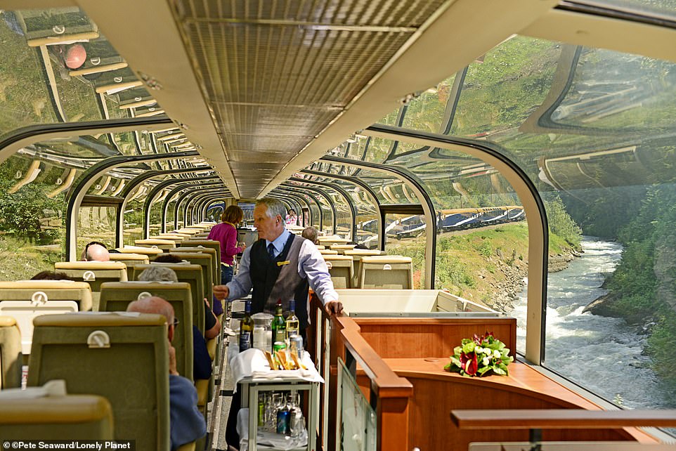 The Rocky Mountaineer traverses spectacular scenery best viewed from the GoldLeaf class viewing car (above)