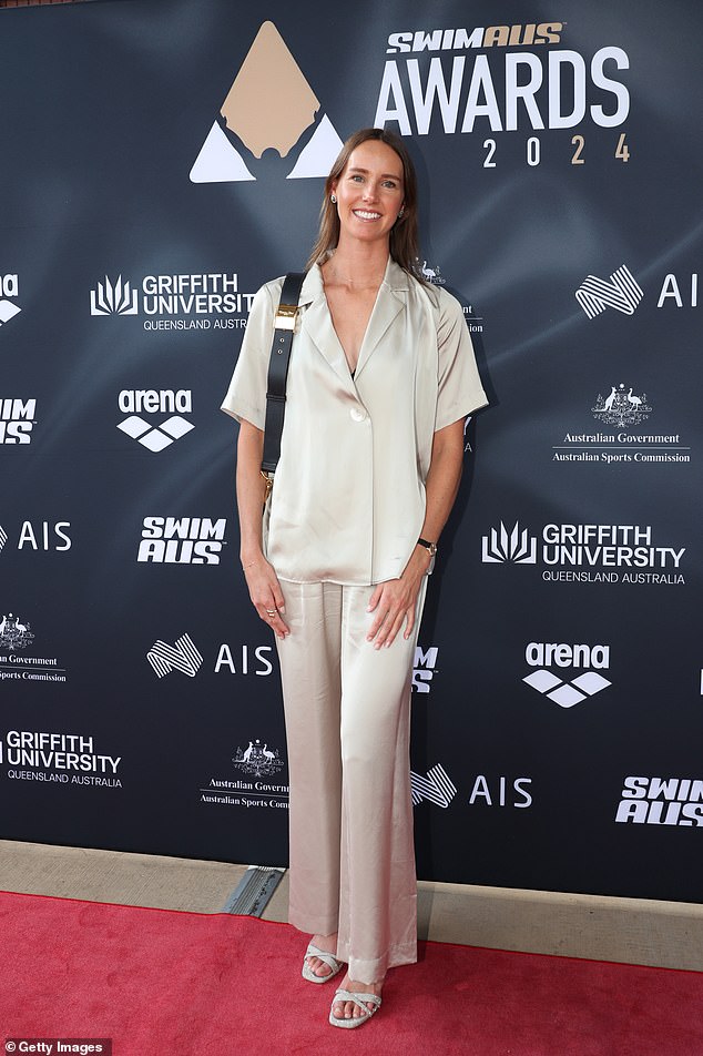 Emma McKeon (pictured) led the celebrity arrival on Saturday as she put on a very glamorous show at the Swimming Australia Awards ceremony in Brisbane