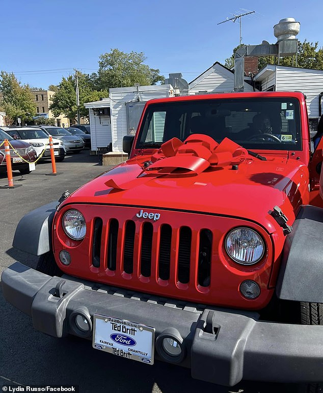 The students raised more than $20,000 to give Apraku his dream car: a Jeep Wrangler with a tire on the back