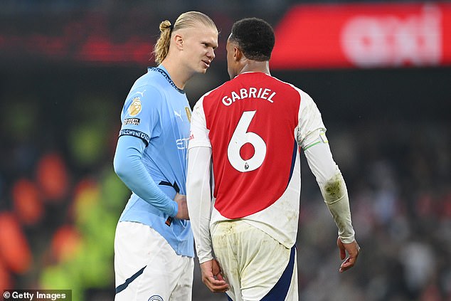 Erling Haaland (left) will not be given a retroactive penalty after throwing the match ball at Gabriel Magalhaes (right) shortly after Man City's dying equaliser against Arsenal