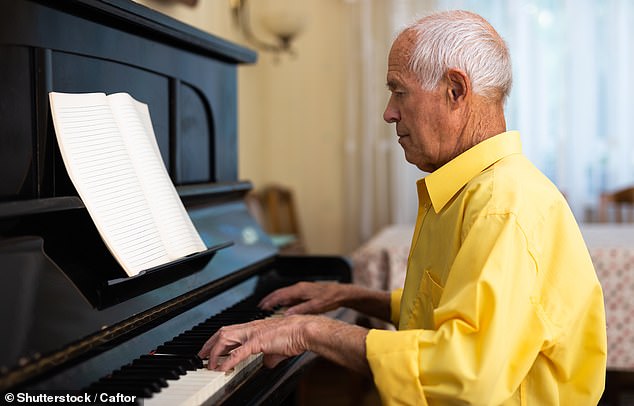 People who regularly play an instrument are less likely to suffer from memory loss, research shows (Stock Image)