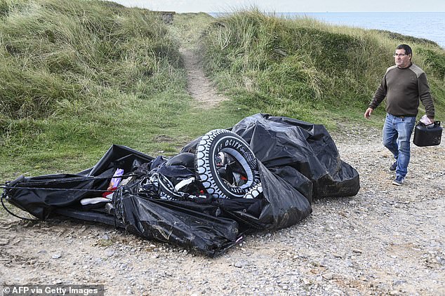 This is believed to be the inflatable rubber dinghy that killed eight migrants on Sunday as they tried to cross the Channel.