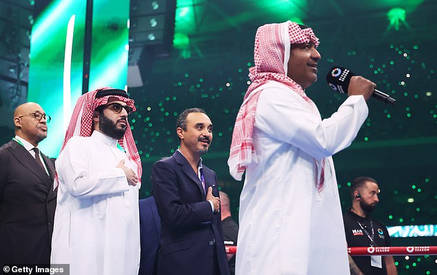 Before the playing of the British national anthem for both fighters, the Saudi national anthem took center stage