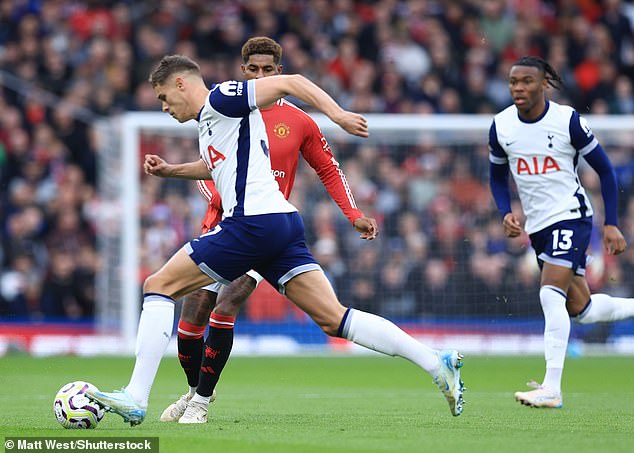 Micky van de Ven (left) intercepted the ball after a heavy touch from Marcus Rashford (center)